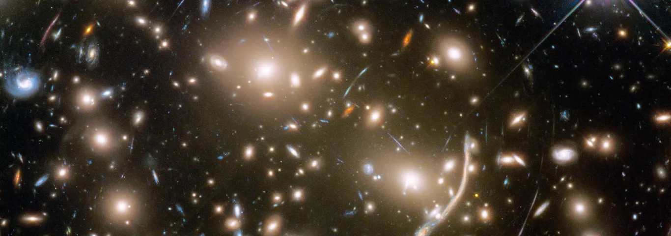 This Hubble Space Telescope mosaic shows a portion of the immense Coma galaxy cluster. This Hubble Space Telescope mosaic shows a portion of the immense Coma galaxy cluster — containing more than 1,000 galaxies — located 300 million light-years away. The 