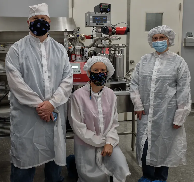 Installation at Johnson Space Center.  From left – Ryan Zeigler, Apollo Sample Curator, NASA (PhD Washington University, 2005); Juliane Gross, Deputy Curator of Apollo samples; Olga Pravdivtseva, WashU Physics.