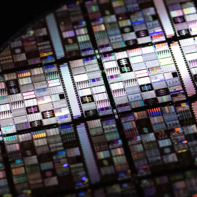 This superconducting qubit wafer was fabricated through the Superconducting Qubits at Lincoln Laboratory (SQUILL) Foundry, which is expanding access to quantum research by fabricating quantum circuits for U.S. research organizations. Photo: Nicole Fandel